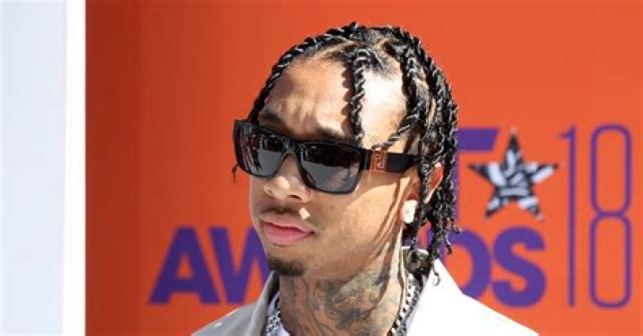 Tyga Fans Lose It After Rapper Straightens His Hair