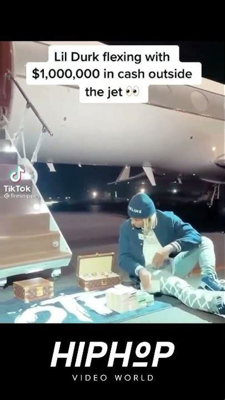 Lil Durk Flexes $1 Million In Cash Outside Private Jet