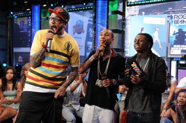 Travie McCoy Opens Up About Tyga Giving Lil Wayne Credit For Discovering Him