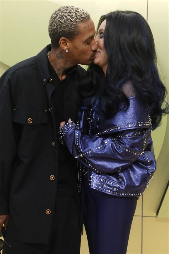 Cher & AE Edwards Share A Passionate Kiss During Red Carpet Debut