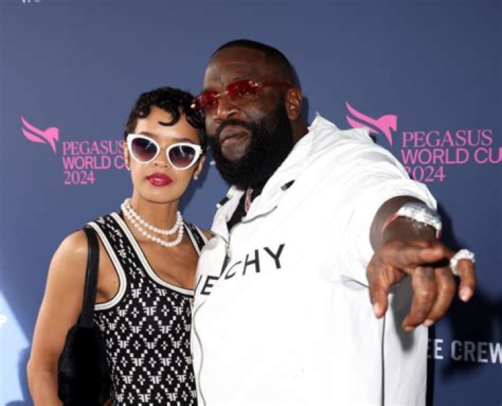 Rick Ross' Model Girlfriend Gets His Name Tattooed On Her
