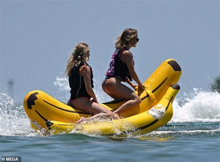 Sydney Sweeney Bares Her Behind While Riding A Banana Boat In A Flowery Bikini