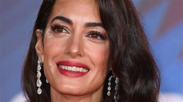 How tall is Amal Clooney