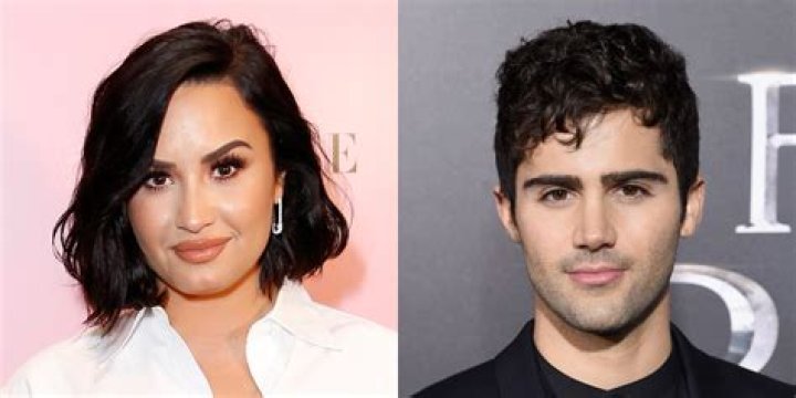 Demi Lovato Confirms Max Ehrich Relationship With a Kiss in Ariana and Justin’s ‘Stuck With U’ Video