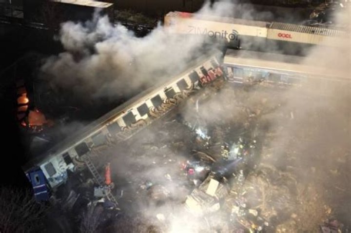 
Fiery Greece train collision kills 32, injures at least 85 