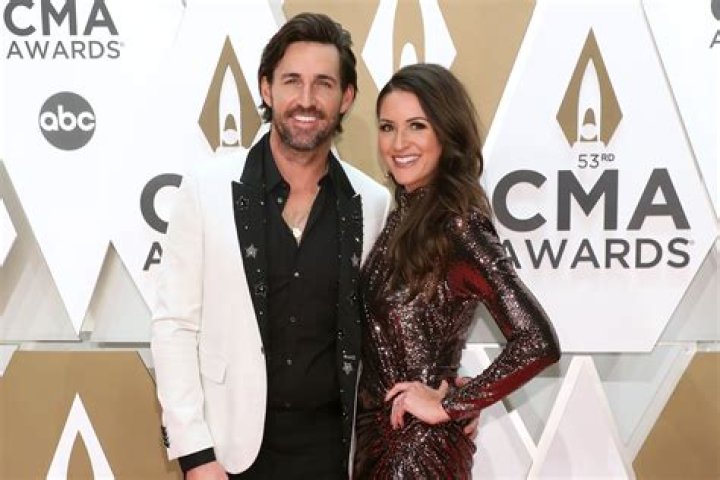 How did Jake Owen meet Erica Hartlein?