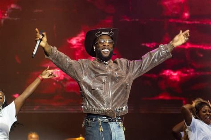 
“I Feel Safer Here” Singer Burna Boy Gets Cozy With Jamaican Artist 