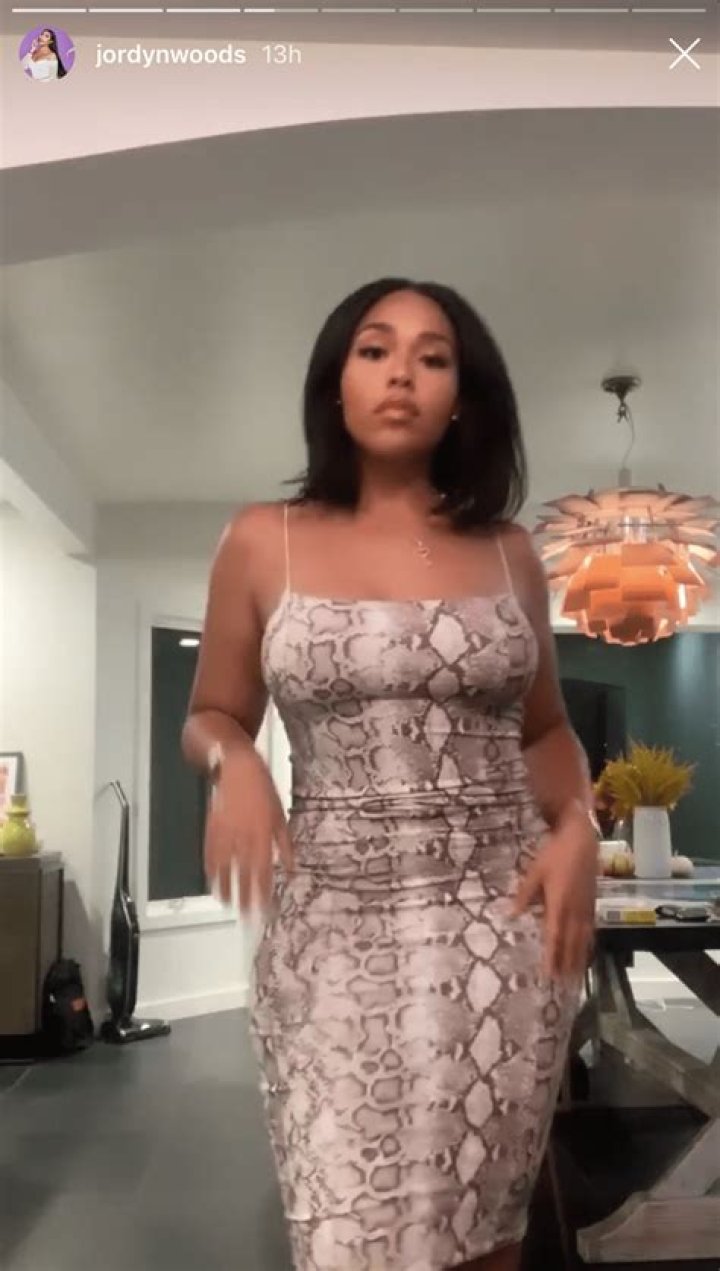 Jordyn Woods Flaunts Her Super Sexy Curves in a Snakeskin Dress and We’re Seriously Shook