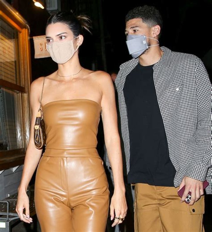 Kendall Jenner Wears Form-Fitting Nude Dress While Holding Hands With Devin Booker Post-Date Night
