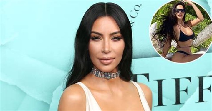 Kim Kardashian Flips Off Camera in Black Leather Bikini Amid Kanye West Drama: ‘Nite Swim’ 