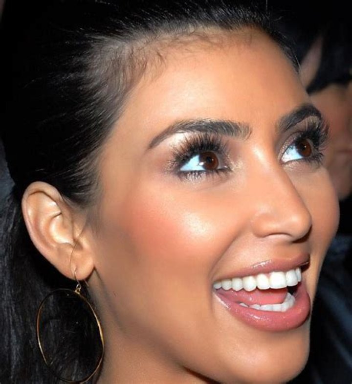 Here’s What the Kardashians Look Like When You Replace Their Famous Scowls With Smiles