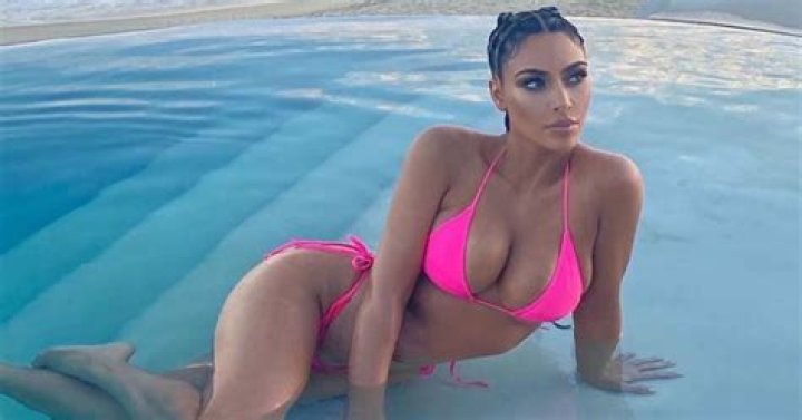 Kim Kardashian Flaunts Her Curves in a Hot Pink String Bikini: ‘Happy Place’
