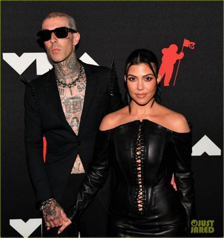 Kourtney Kardashian and Travis Barker Kiss, Make Red Carpet Debut at the 2021 MTV VMAs