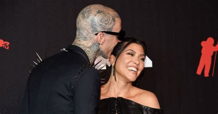 Kourtney Kardashian Shows Off Sexy Panties on Rose-Covered Bed After Napa Trip With Travis Barker