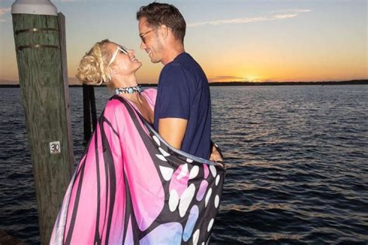 
Paris Hilton Wears Dreamy Butterfly Dress on Vacation in the Bahamas with Husband Carter Reum 