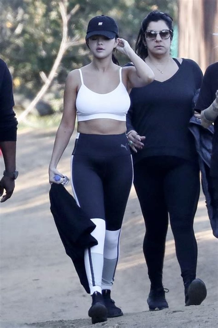 ‘Tis The Season! Selena Gomez Looks Amazing In Red Workout Pants During A Hike With Friends