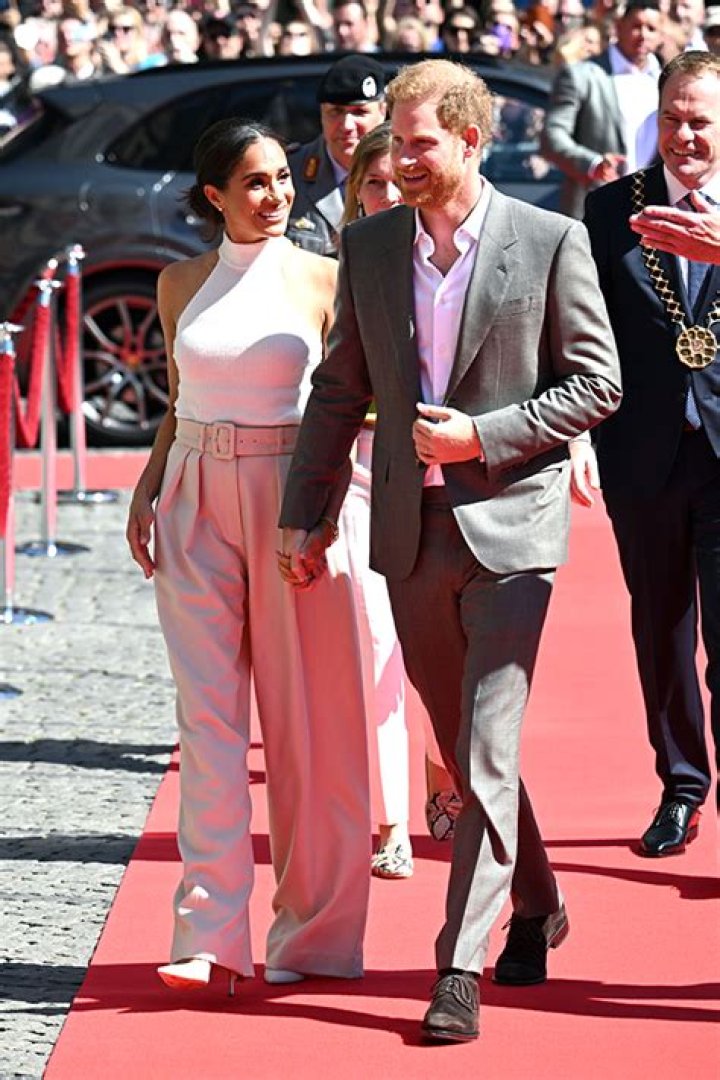 Prince Harry and Meghan Markle Look Cute AF Holding Hands