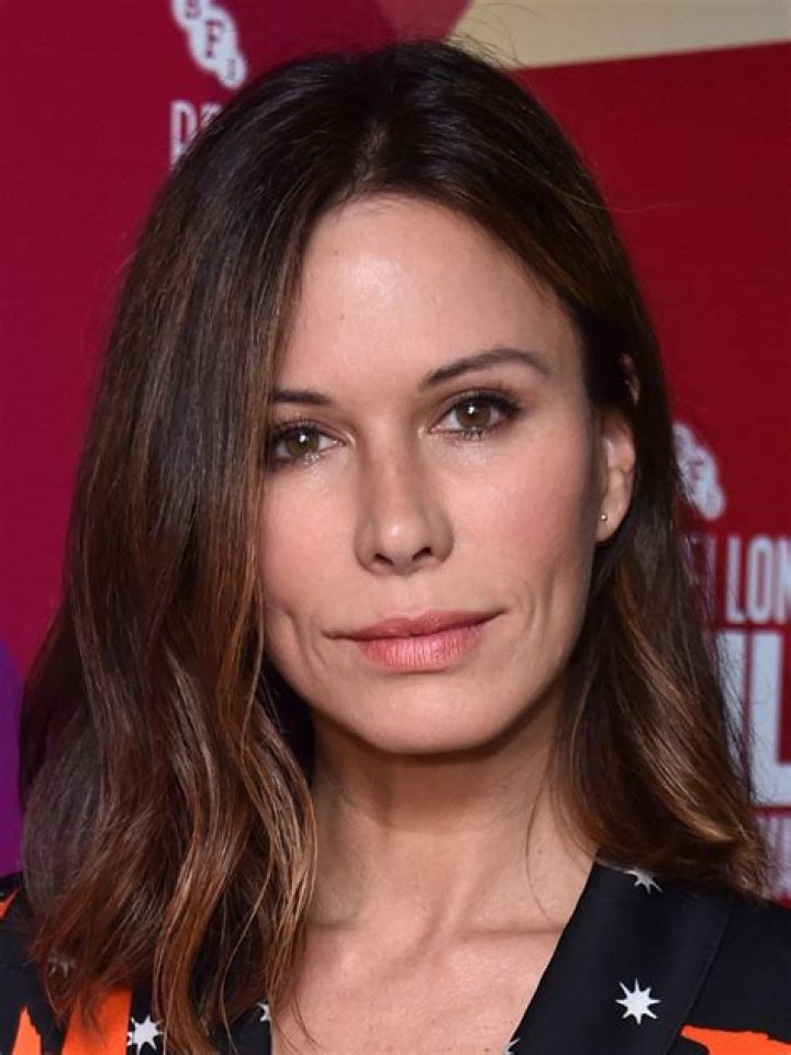 Rhona Mitra (TV Actress) - Age, Birthday, Bio, Facts, Family, Net Worth, Height & More