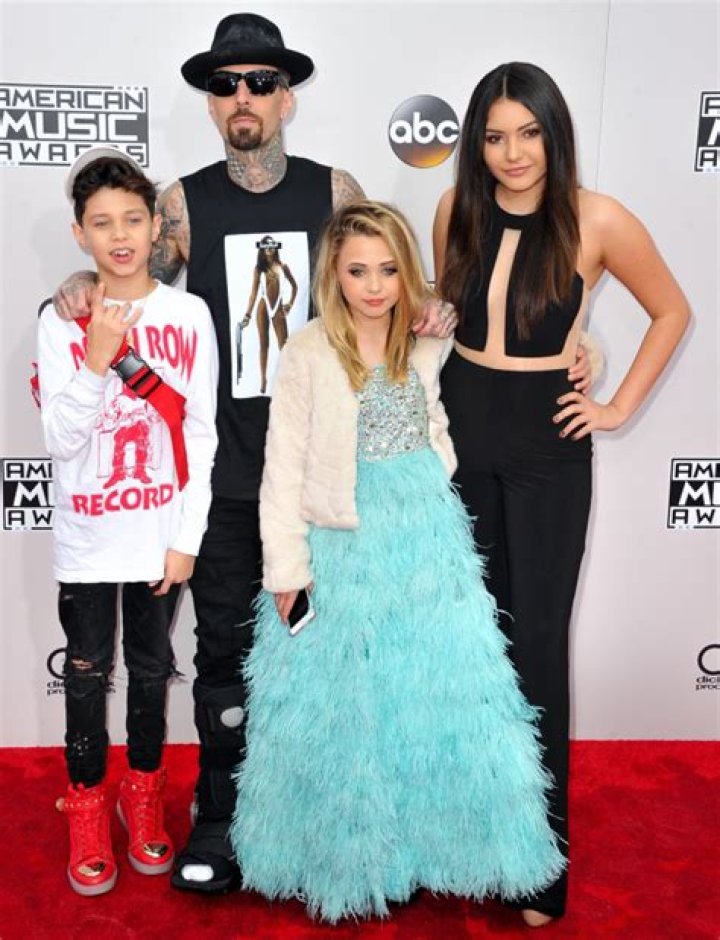 Family BondingTravis Barker Brings His Kids to the AMAs For Rare Public Outing