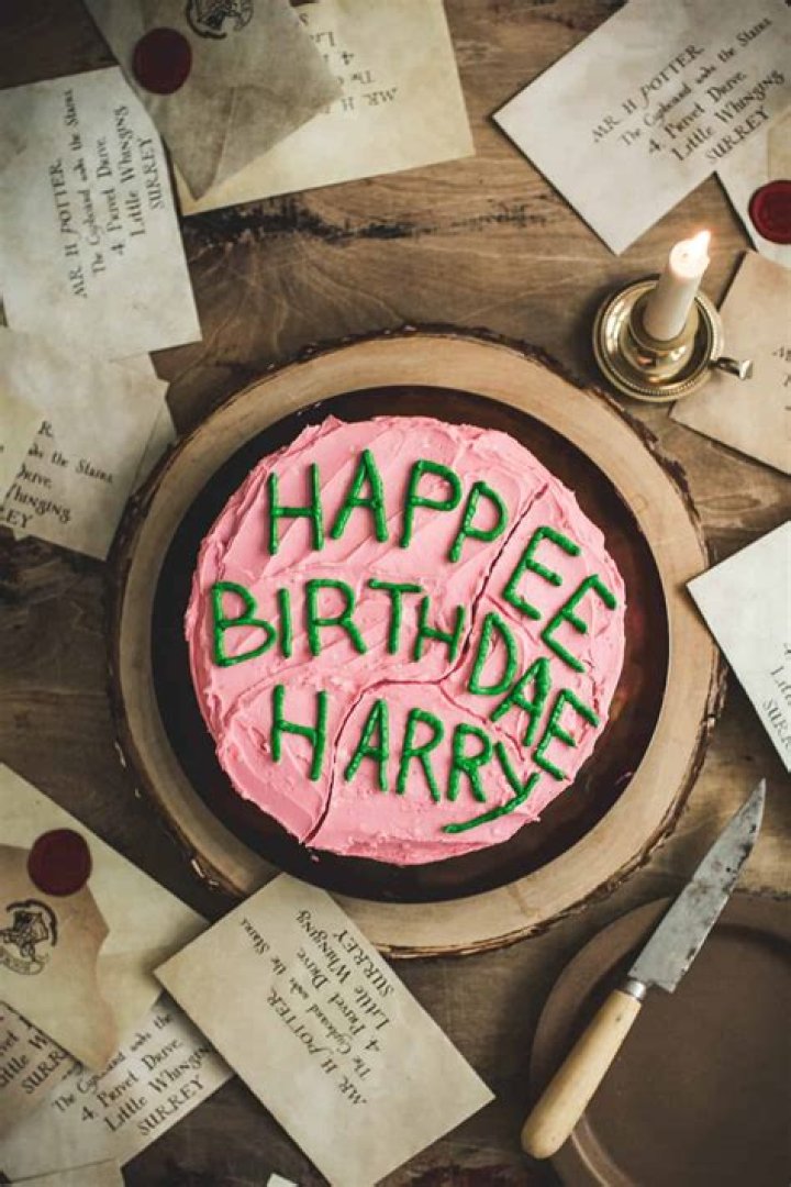 What does Hagrid say when he gives Harry his cake?