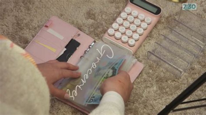 
What is cash stuffing? Meaning explained as 31-year-old goes viral for clearing $70,000 debt with genius hack 