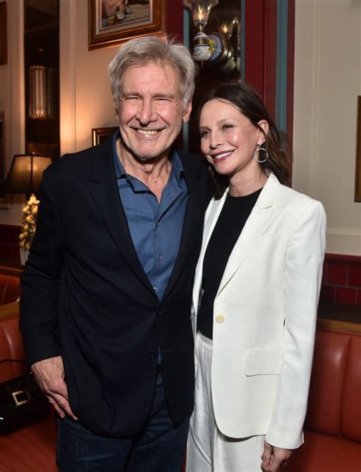 When did Harrison Ford divorce his first wife?